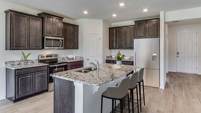 1386 Nw 127 Th Dr, House other with 4 bedrooms, 3 bathrooms and null parking in NEWBERRY FL | Image 4