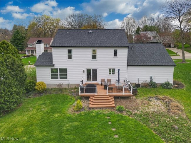 BACK OF HOUSE WITH DECK VIEW. | Image 36