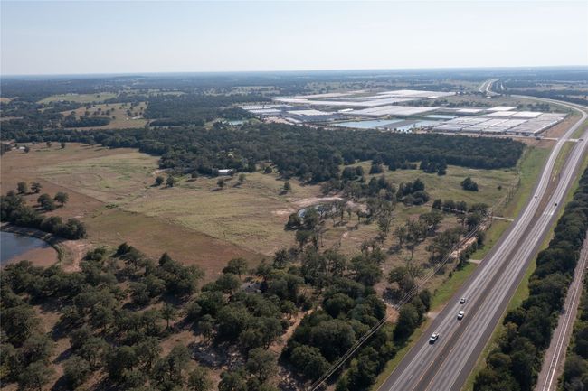 Aerial view of property's location featuring a main thoroughfare | Image 13