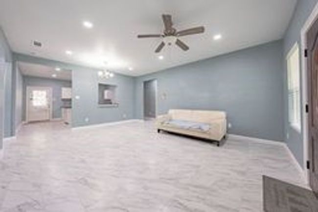 Living area with baseboards, ceiling fan, and recessed lighting | Image 14