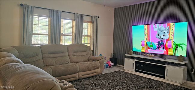 View of carpeted living area | Image 4