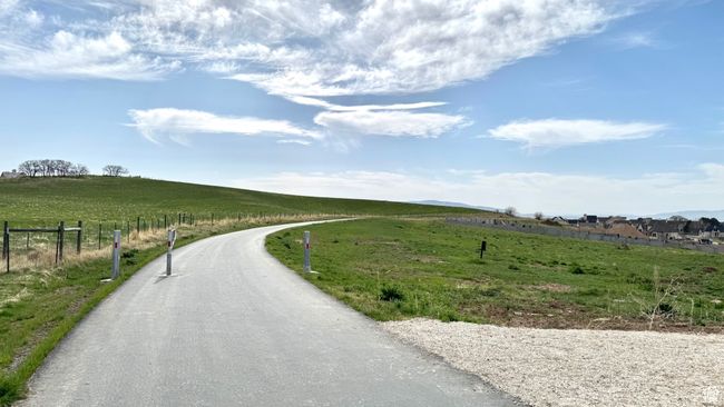 View of asphalt street with a view of countryside | Image 10