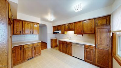 Kitchen featuring sink, dishwasher, tasteful backsplash, and plenty of natural light | Image 2