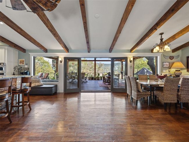 Great room opens out to the spacious back patio. | Image 7