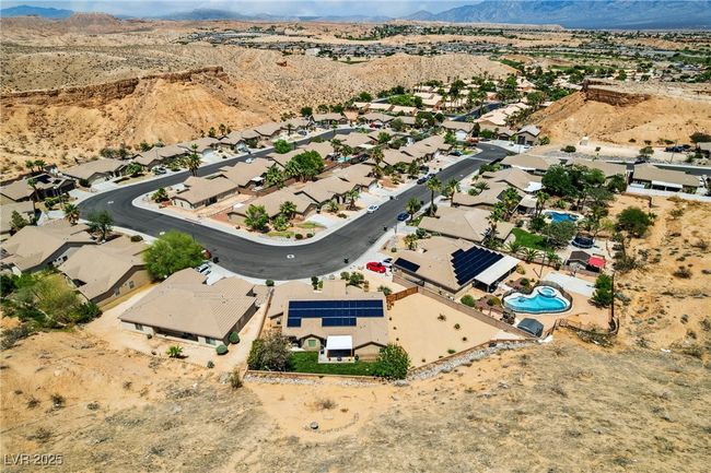 Aerial view of residential area with mountains and a desert landscape | Image 46
