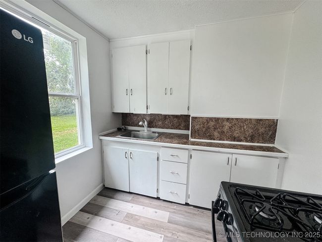 916 Coy Ave, Home with 3 bedrooms, 2 bathrooms and null parking in Tahlequah OK | Image 31