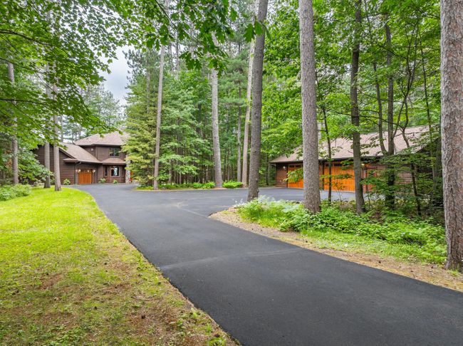 5407 Bluebird Point Rd, House other with 4 bedrooms, 5 bathrooms and null parking in MANITOWISH WATERS WI | Image 49
