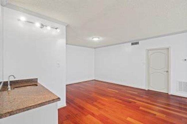 Wet bar off of the formal dining room is perfect for entertaining. | Image 15