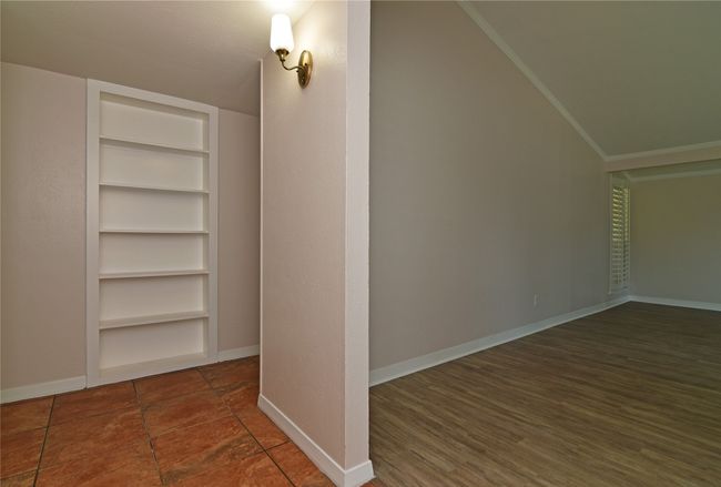Additional living space featuring built in shelves | Image 7