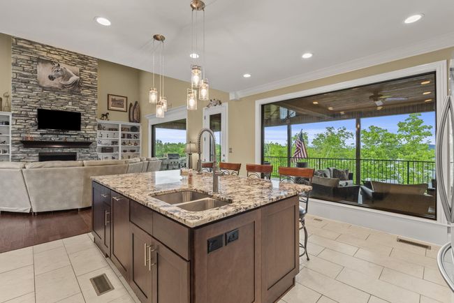 Kitchen with picture window. | Image 16