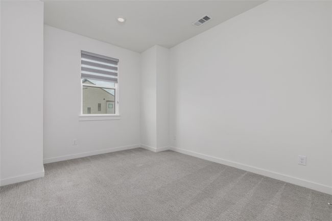 Spare room featuring light colored carpet and recessed lighting | Image 23
