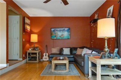 Living room featuring hardwood floors | Image 3