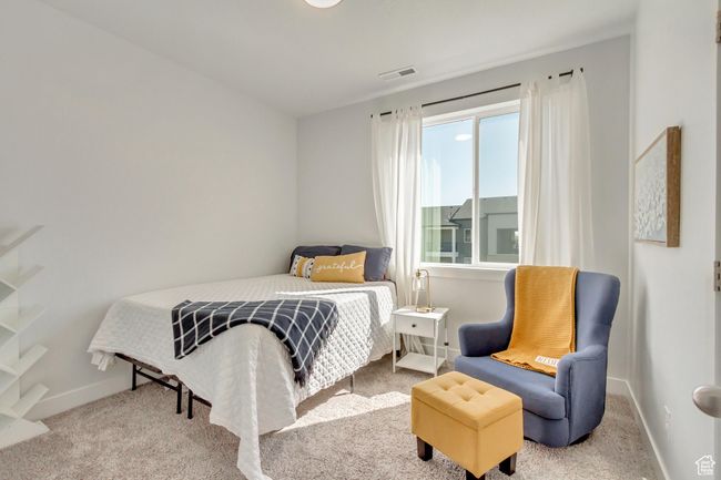 Snuggle up and hit play—this bedroom is perfect for movie nights and cozy vibes! #MovieMarathonReady | Image 13