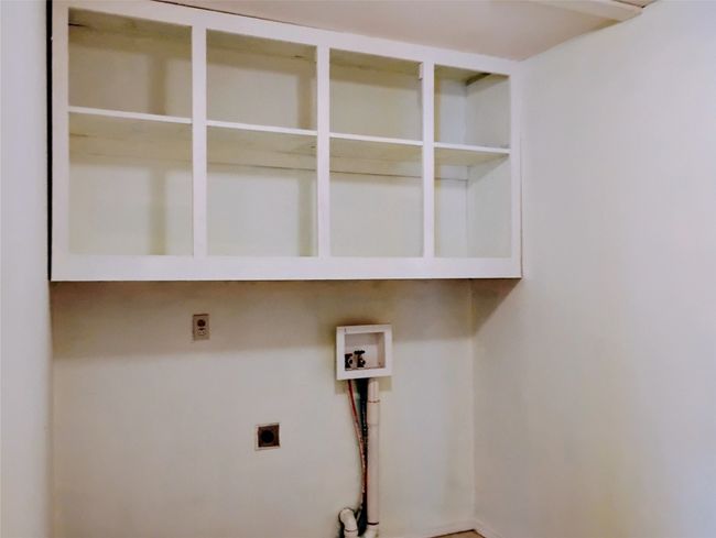 Plenty of space for a folding table or extra storage. | Image 14