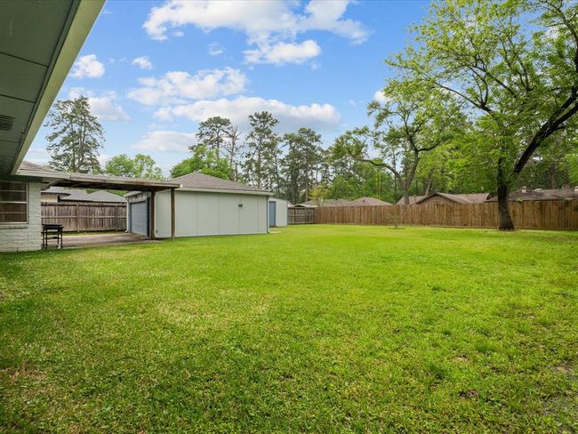 Check out this yard space! Large enough for all your gatherings or adding a pool. | Image 22