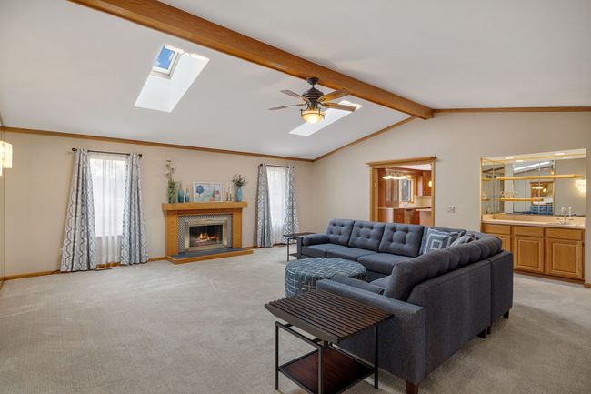 Great Room with skylights and fireplace | Image 8