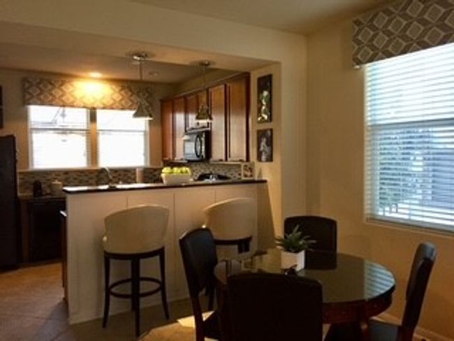 Dining space featuring plenty of natural light | Image 8