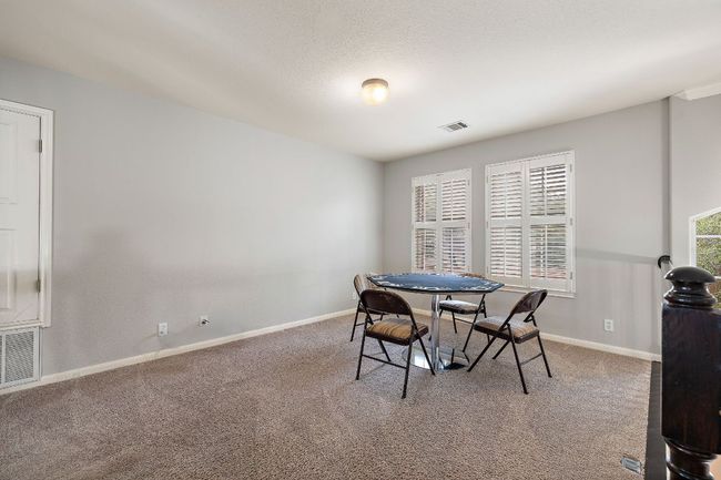The upstairs bonus area is great for a game room or flex space! | Image 28