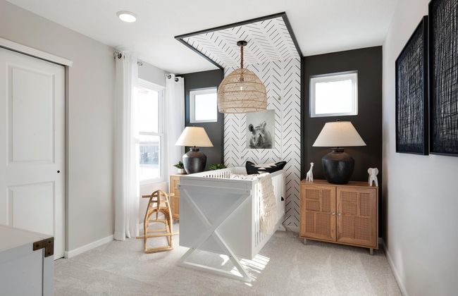 The Ashton also features two large guest bedrooms perfect for any use! Photo of model home. | Image 13