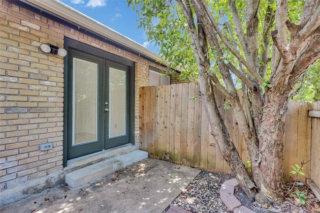 Doorway to property with brick siding and french doors | Image 24