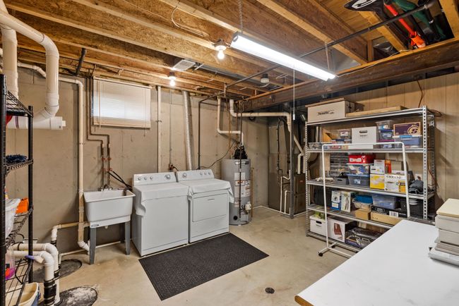 Laundry w/Util sink & large storage/mechanical rm | Image 56