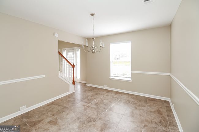 7144 Caspian Dr, House other with 7 bedrooms, 3 bathrooms and null parking in Fairburn GA | Image 5