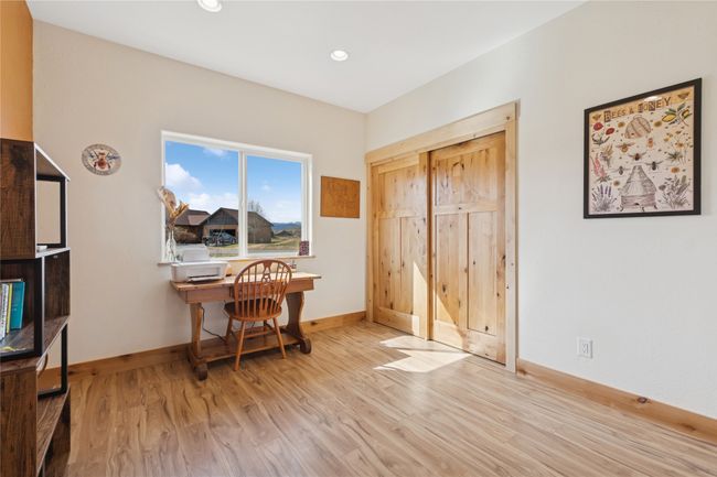 Office area featuring light wood-type flooring, baseboards, and recessed lighting | Image 11