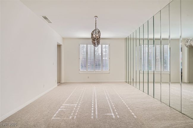 Unfurnished room featuring baseboards, visible vents, and carpet flooring | Image 24