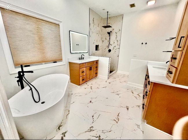 Brand new renovation on the Master Bathroom which features brand new updated shower, tile, double vanities and tub. Glass to be installed soon! | Image 20