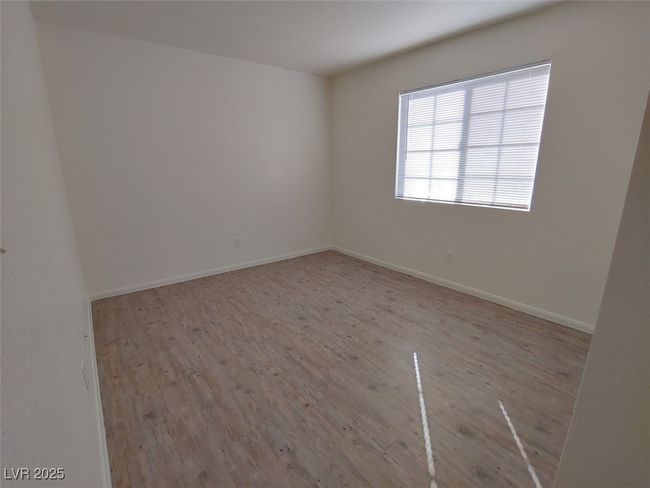 Unfurnished room with light wood-type flooring | Image 7