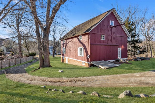 View of outdoor structure featuring a yard | Image 4