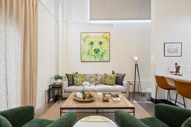 Living area with finished concrete flooring | Image 4