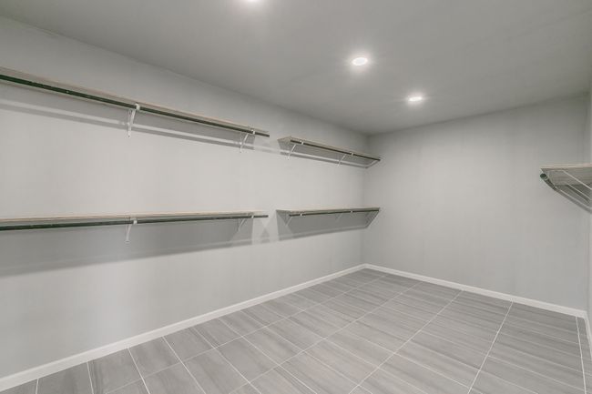 View of spacious closet | Image 11