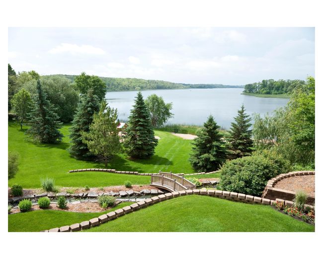The property is incredibly well designed with an extensive array of landscaping, irrigation and gorgeous lighting system | Image 4
