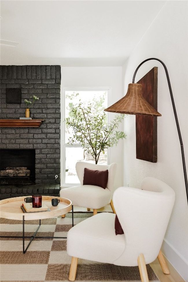 Living room featuring a fireplace and wood finished floors | Image 9