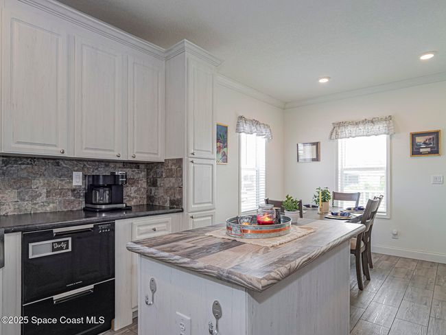 623 Hyacinth Cir, House other with 3 bedrooms, 2 bathrooms and null parking in Barefoot Bay FL | Image 18