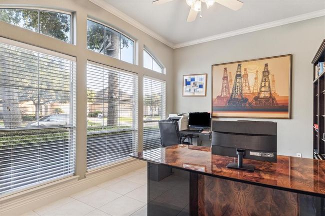 Immediately to the left of the entry, walk through french doors & enter into your Office. | Image 6