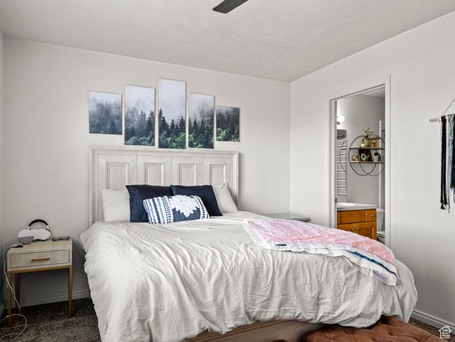 Carpeted bedroom with ceiling fan | Image 19