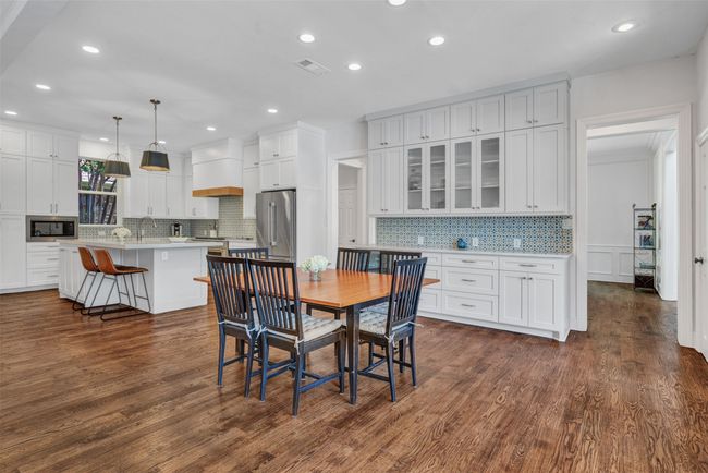 This can be your view every day! The great room is a wonderful living space with versatility to use it however fits your family the best. The large windows (and door!) give unparalleled views of the covered patio and pool. | Image 22