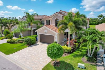 Mediterranean / spanish home with a garage | Image 3