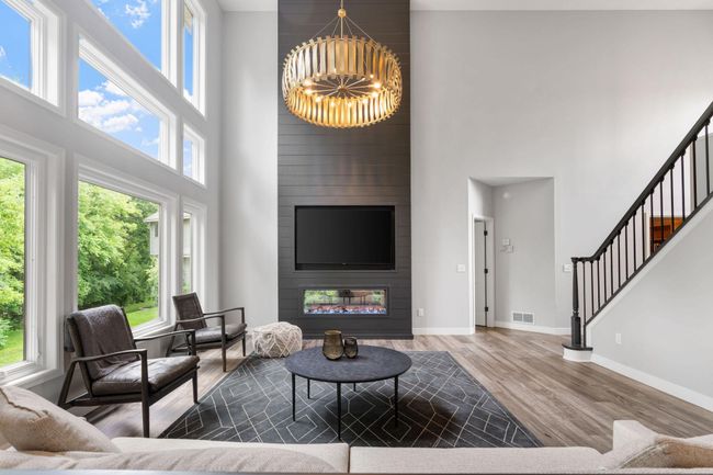 The beautiful two story fireplace is a show stopper. | Image 4