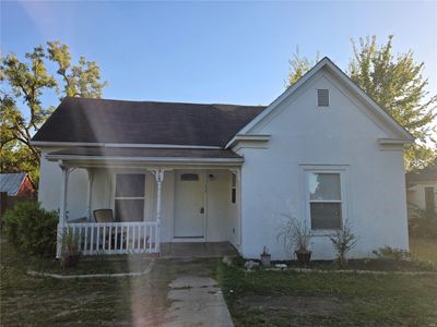 Bungalow-style house with covered porch | Image 1