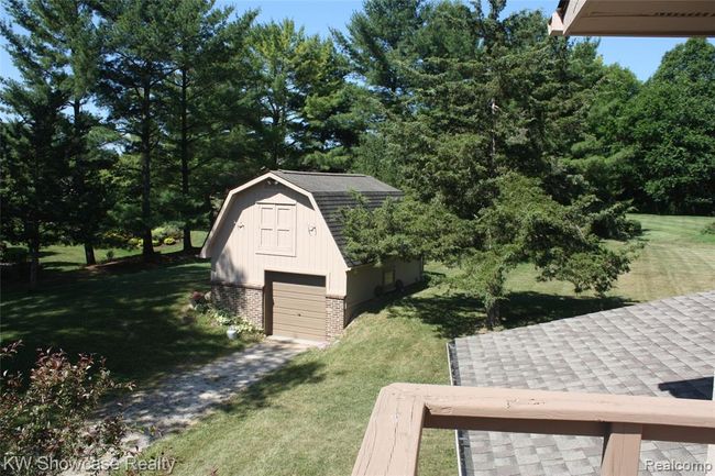 View of the 2 story barn from the loft area private balcony. | Image 42