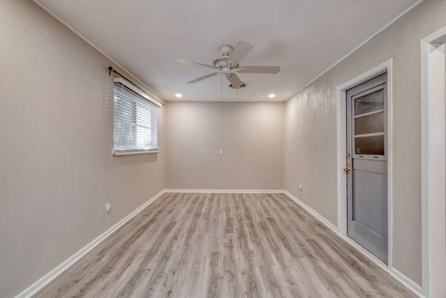 Dining room with ceiling fan, recessed lighting, 2024 laminate flooring, and baseboards | Image 8