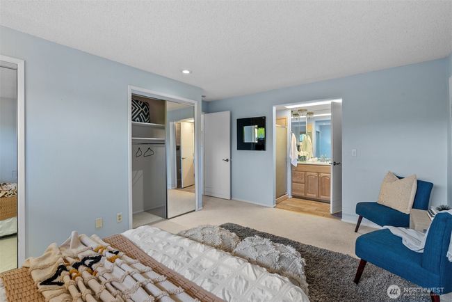 Primary bedroom with three quarter en suite bath is a wonderful feature! | Image 22