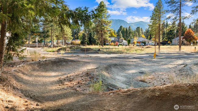 As the newest PNW master-planned community, enjoy 200+ acres of open space, trails & the Coal Trax Mt Bike Park. Soaring ceilings in the great roommake each day worthy of celebration & open floorplan appeals to entertaining. Covered deck & patio. Southern-facing homesites range from the mid600s- 900ks. Enjoy a variety of innovative & distinctive new home options with the best all-season recreation just moments away! Built for the future, indulge in a retreat just 90-min to Seattle. Plans and elevations are artist’s renderings only, may not accurately represent the actual condition of a home asconstructed and may also contain options and upgrades which are not included in the sale. Trailside Homes reserves the right to make changes to the floorplan, specifications, dimensions, design and elevations without prior notice. Stated dimensions and square footage are estimated and should not be usedas representations of the home’s actual size. | Image 34