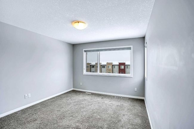 201 - 70 Saddlestone Dr Ne, Townhouse with 2 bedrooms, 3 bathrooms and 1 parking in Calgary AB | Image 5