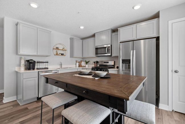 This spacious kitchen is sure to please the family chef! Photo is of model home. Colors and options may vary. Ask Sales Agent for details. | Image 5