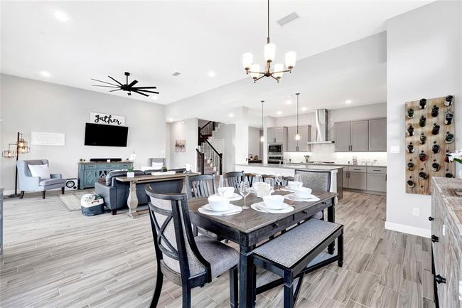 Separate dining area fluid with the kitchen | Image 23