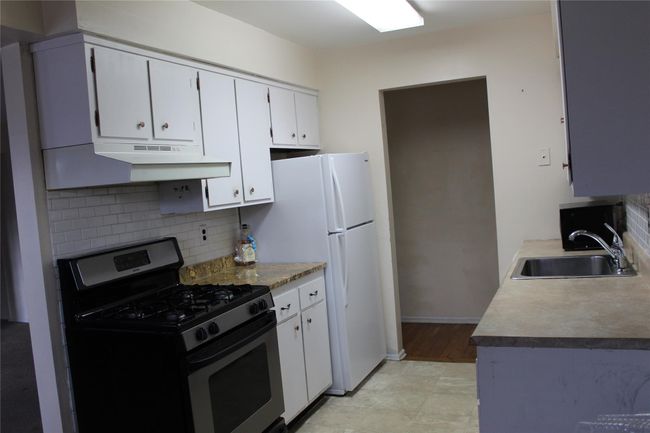 Kitchen with window in dinette area | Image 5